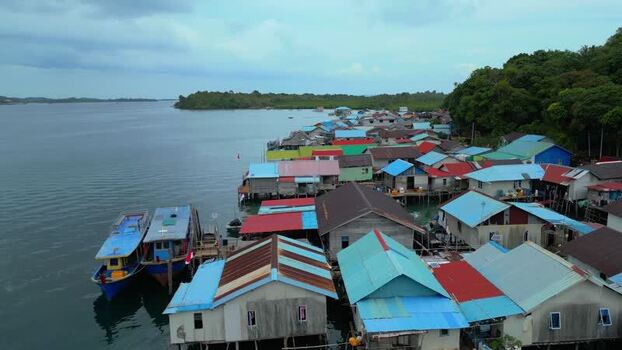 Aerial view of stilt houses on Batam Island Indonesia. Aerial view of stilt houses on Batam Island Indonesia.