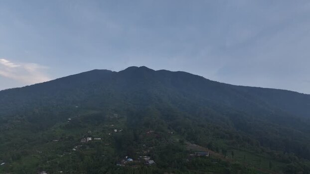 Aerial view of Joglo Java Neglasari and lush mountains Indonesia. Aerial view of Joglo Java Neglasari and lush mountains Indonesia.