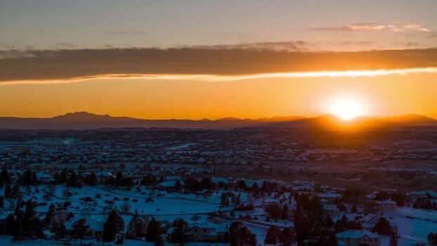 Aerial view of snowy landscape at sunset in Parker United States.
