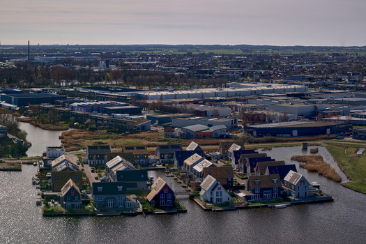 Wormerveer Netherlands 15 May 2026 Aerial view of De Pijl former animal feed factory and modern residential islands in West Knollendam. Wormerveer Netherlands 15 May 2026 Aerial view of De Pijl former animal feed factory and modern residential islands in West Knollendam.