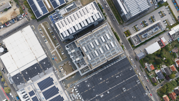 Aerial view of the Equinix Data Center on Friesstrasse with its industrial rooftops cooling units and surrounding parking facilities in Frankfurt am Main Hessen Germany.