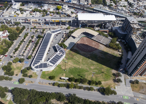 Aerial view of the baseball field and modern building with solar panels at Fundidora Park in Monterrey Nuevo Leon Mexico. Aerial view of the baseball field and modern building with solar panels at Fundidora Park in Monterrey Nuevo Leon Mexico.