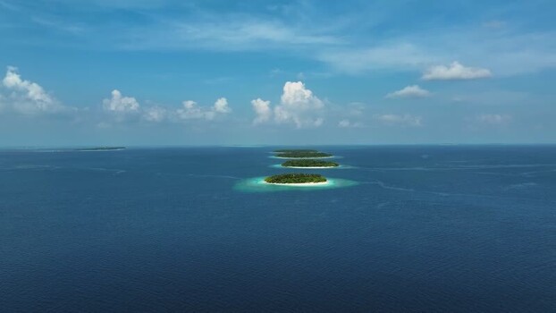 Aerial view of tropical islands in the deep blue ocean Maldives. Aerial view of tropical islands in the deep blue ocean Maldives.