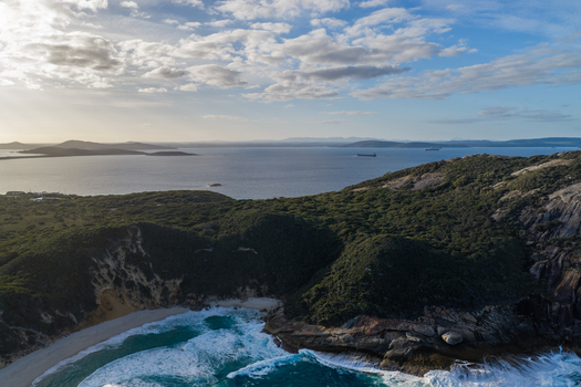 Aerial view of Salmon Holes with turquoise waters rugged coastline rocky cliffs and lush vegetation in Torndirrup Western Australia Australia.