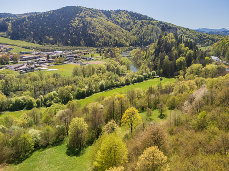 Aerial view of Orava Castle perched on a high rock above the Orava river surrounded by lush green forests and rolling hills in spring Dolny Kubin Zilinsky kraj Slovakia. Aerial view of Orava Castle perched on a high rock above the Orava river surrounded by lush green forests and rolling hills in spring Dolny Kubin Zilinsky kraj Slovakia.