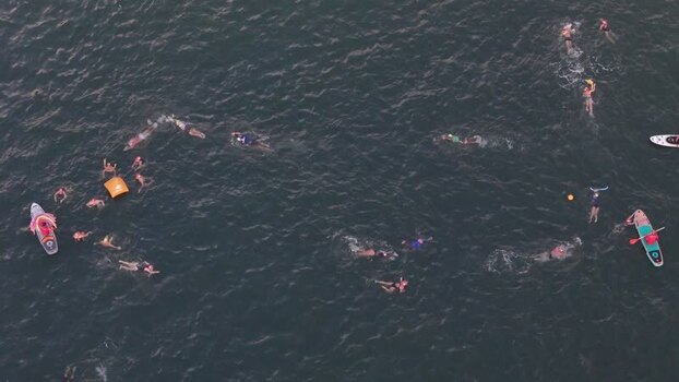 Aerial view of people swimming at Red Beach Brazil. Aerial view of people swimming at Red Beach Brazil.
