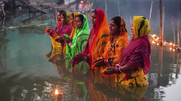 View of women performing a religious ritual in the water Bangladesh. View of women performing a religious ritual in the water Bangladesh.