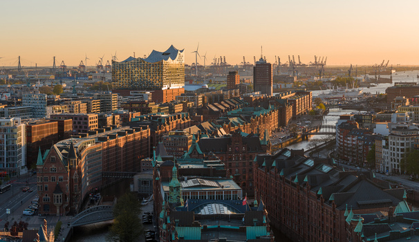 Aerial view of the historic Speicherstadt warehouse district and Elbphilharmonie concert hall during golden hour in Hamburg Hamburg Germany. Aerial view of the historic Speicherstadt warehouse district and Elbphilharmonie concert hall during golden hour in Hamburg Hamburg Germany.
