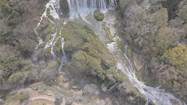 Aerial view of Marmore Falls cascading in Terni Italy.