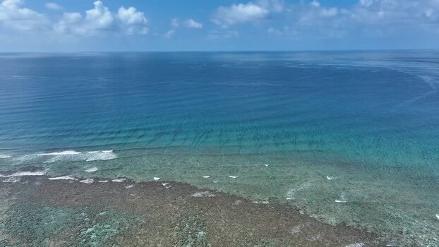 Aerial view of turquoise ocean and coral reef in Maldives. Aerial view of turquoise ocean and coral reef in Maldives.
