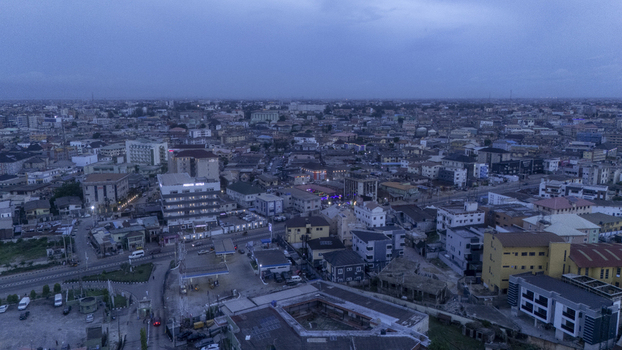 Aerial view of Allen Avenue and the urban skyline featuring the Presken Hotel and residential buildings under a twilight sky in Ikeja Lagos Nigeria. Aerial view of Allen Avenue and the urban skyline featuring the Presken Hotel and residential buildings under a twilight sky in Ikeja Lagos Nigeria.