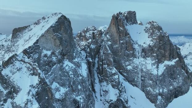 Aerial view of the snow covered Pale di San Martino peaks Italy.