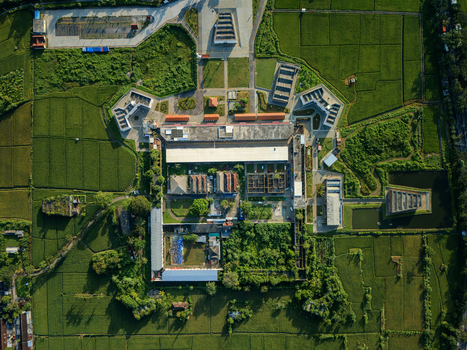 Aerial view of the historic Benteng Fort Willem I with its rectangular stone walls and internal structures surrounded by lush green rice fields in Ambarawa Central Java Indonesia. Aerial view of the historic Benteng Fort Willem I with its rectangular stone walls and internal structures surrounded by lush green rice fields in Ambarawa Central Java Indonesia.