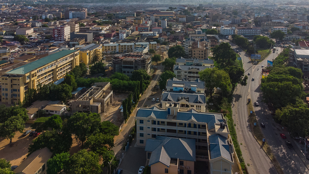 Aerial view of Accra Technical University campus buildings surrounded by urban streets lush trees and city infrastructure in Accra Greater Accra Region Ghana. Aerial view of Accra Technical University campus buildings surrounded by urban streets lush trees and city infrastructure in Accra Greater Accra Region Ghana.