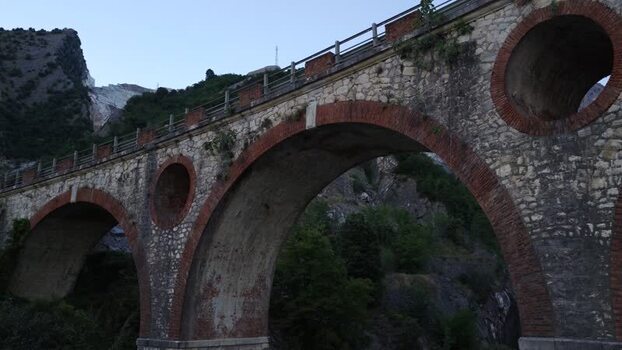 Aerial view of historic stone bridge in Carrara Italy. Aerial view of historic stone bridge in Carrara Italy.