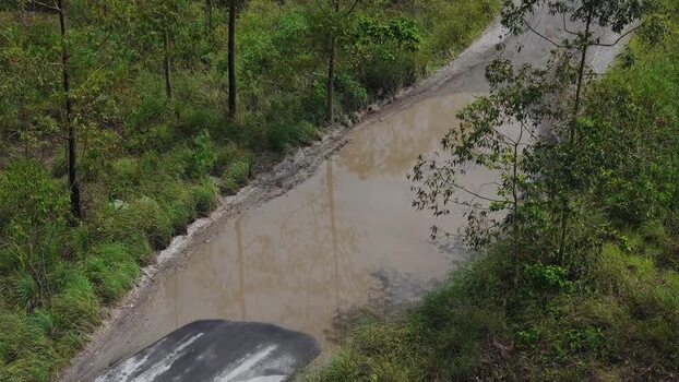 Aerial view of muddy road near Mount Batur in Kintamani Indonesia. Aerial view of muddy road near Mount Batur in Kintamani Indonesia.