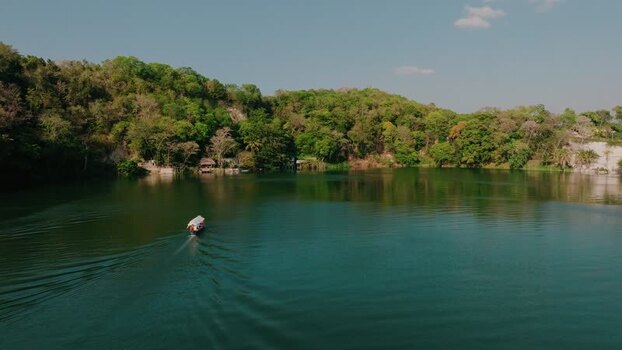 Aerial view of a boat on Lake Peten Itza Guatemala.