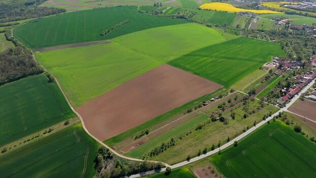 Aerial view of agricultural fields and village in Brno Czechia.