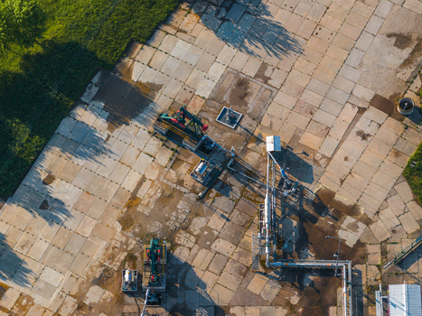 Aerial view of the UGS Damborice facility with pumpjacks and industrial pipelines on concrete slabs Damborice South Moravian Region Czechia. Aerial view of the UGS Damborice facility with pumpjacks and industrial pipelines on concrete slabs Damborice South Moravian Region Czechia.