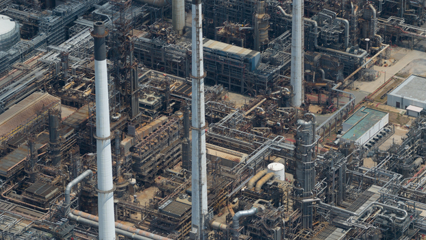 Aerial view of the Eastern Economic Corridor of Innovation EECi with its complex network of industrial pipes tall chimneys and steel structures in Tambon Pa Yup Nai Chang Wat Rayong Thailand. Aerial view of the Eastern Economic Corridor of Innovation EECi with its complex network of industrial pipes tall chimneys and steel structures in Tambon Pa Yup Nai Chang Wat Rayong Thailand.