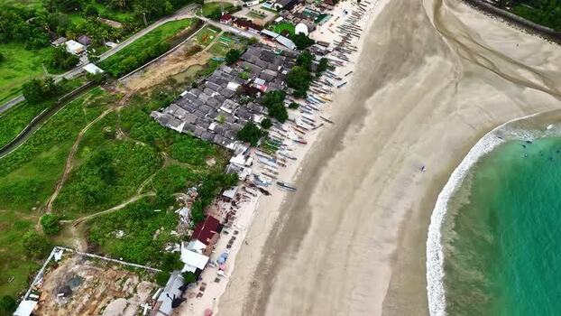 Aerial view of fishing boats on a beach in Bali Indonesia.
