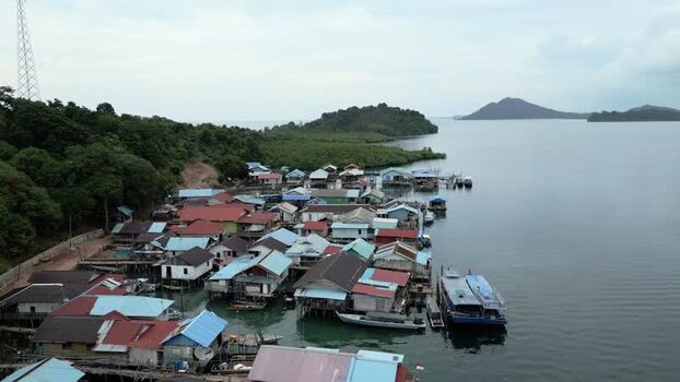 Aerial view of stilt houses on Batam Island Indonesia. Aerial view of stilt houses on Batam Island Indonesia.