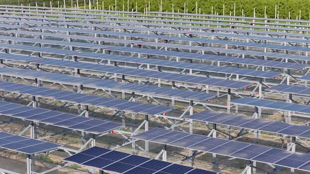 Aerial view of solar panels in a field in Faenza Italy.