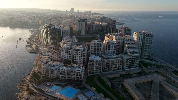 Aerial view of modern buildings and coastline in Sliema Malta. Aerial view of modern buildings and coastline in Sliema Malta.