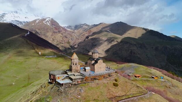 Aerial view of Gergeti Trinity Church in the mountains Georgia.