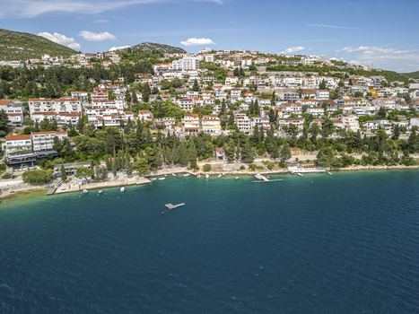 Aerial view of Neum Beach with its Mediterranean architecture lush greenery and clear blue Adriatic Sea waters in Neum Federation of Bosnia Bosnia and Herzegovina.