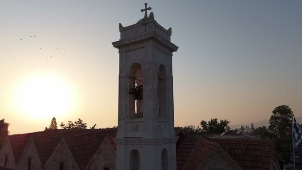 Aerial view of church bell tower at sunset Cyprus.