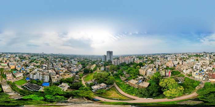 Aerial view of the urban landscape of Ranchi featuring dense residential buildings lush green patches and a clear sky in Ranchi Jharkhand India.