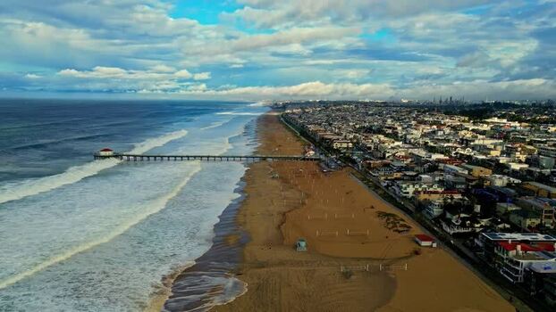 Aerial view of the coastline and pier in United States.