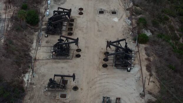 Aerial view of oil pump jacks in Baldwin Hills United States.