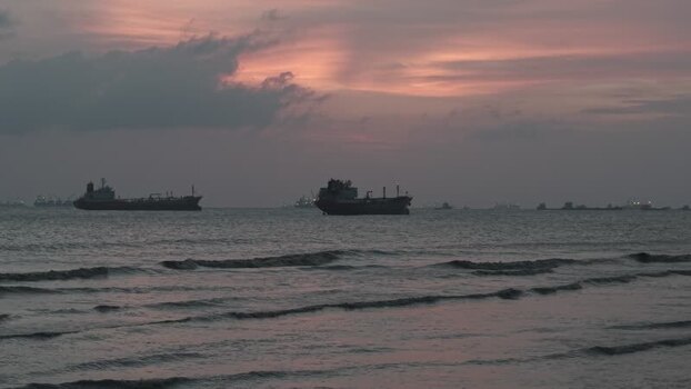 Aerial view of Parki Beach with cargo ships at sunset Bangladesh.