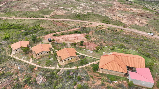 Torotoro Bolivia 29 September 2026 Aerial view of Torotoro Hostal Restaurante featuring stone buildings with terracotta roofs set in a rugged landscape.