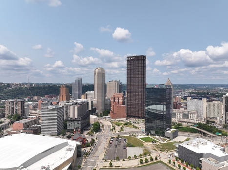 Pittsburgh Pennsylvania United States 26 July 2026 Aerial view of the Pittsburgh skyline featuring the UPMC Steel Building modern skyscrapers urban streets and a clear blue sky.