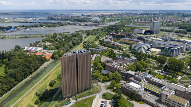 Amsterdam Netherlands 09 June 2026 Aerial view of Digital Realty Amsterdam AMS17 data center surrounded by modern office complexes lush green spaces and canals in the Science Park area. Amsterdam Netherlands 09 June 2026 Aerial view of Digital Realty Amsterdam AMS17 data center surrounded by modern office complexes lush green spaces and canals in the Science Park area.