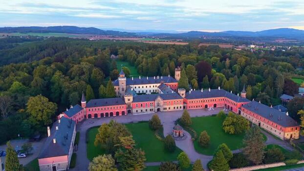 Aerial view of Sychrov Castle surrounded by lush parkland Czechia. Aerial view of Sychrov Castle surrounded by lush parkland Czechia.
