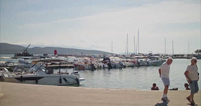 View of the harbor in Krk with moored boats Croatia. View of the harbor in Krk with moored boats Croatia.