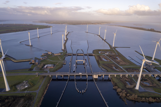 Aerial view of Krammer locks with wind turbines water channels and a bridge in Bruinisse Zeeland Netherlands. Aerial view of Krammer locks with wind turbines water channels and a bridge in Bruinisse Zeeland Netherlands.