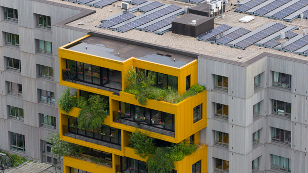 Aerial View of Ecological Residential Building with Green Facades Aerial View of Ecological Residential Building with Green Facades