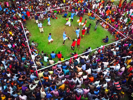 Nilphamari Bangladesh 01 May 2026 Aerial view of a traditional Lathi Khela performance with stick fighters and drummers surrounded by a large crowd on a green field. Nilphamari Bangladesh 01 May 2026 Aerial view of a traditional Lathi Khela performance with stick fighters and drummers surrounded by a large crowd on a green field.