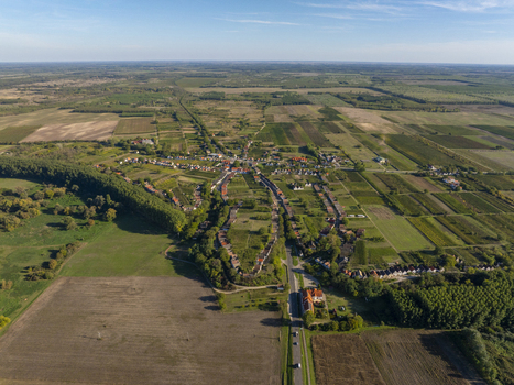 Aerial view of Hajos pincefalu a historic wine cellar village with rows of traditional cellars surrounded by agricultural fields and vineyards in Hajos Hungary. Aerial view of Hajos pincefalu a historic wine cellar village with rows of traditional cellars surrounded by agricultural fields and vineyards in Hajos Hungary.