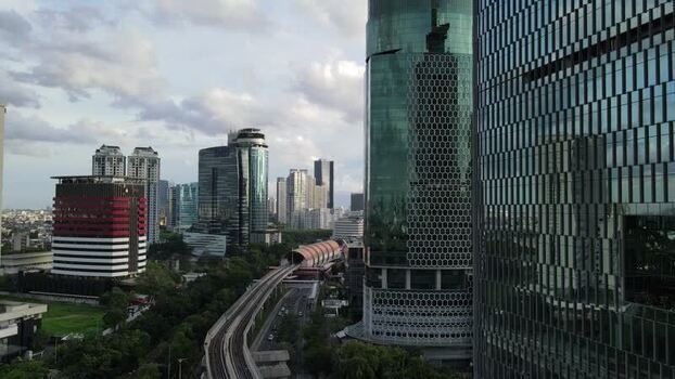 Aerial view of skyscrapers and LRT track in Jakarta Indonesia. Aerial view of skyscrapers and LRT track in Jakarta Indonesia.