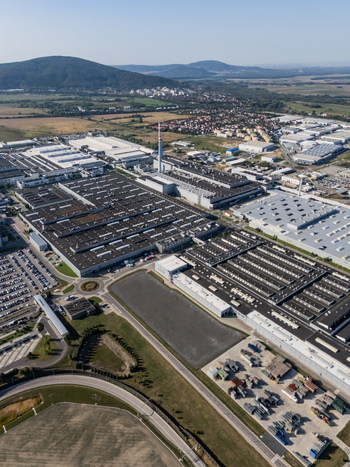 Aerial view of the Volkswagen plant near Devinska Nova Ves with vast industrial buildings parking lots and rolling hills in the background Bratislava Bratislavsky kraj Slovakia. Aerial view of the Volkswagen plant near Devinska Nova Ves with vast industrial buildings parking lots and rolling hills in the background Bratislava Bratislavsky kraj Slovakia.
