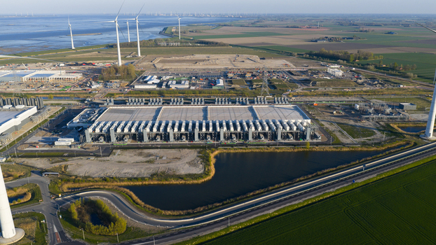 Drone view of a hyperscale data center in Eemshaven showing cloud computing server infrastructure cooling systems backup power and digital connectivity. Drone view of a hyperscale data center in Eemshaven showing cloud computing server infrastructure cooling systems backup power and digital connectivity.