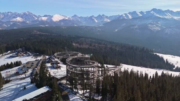 Aerial view of SkyWalk Serce Poronina above snowy Tatras in Poland Aerial view of SkyWalk Serce Poronina above snowy Tatras in Poland