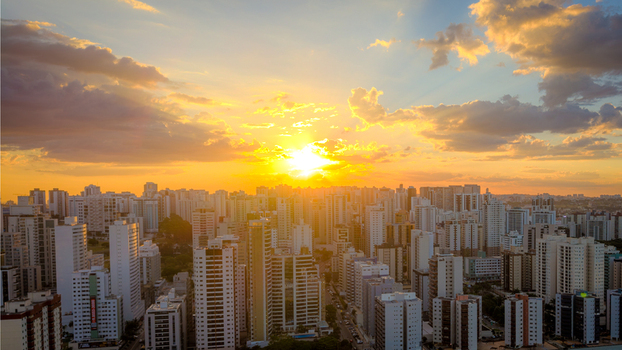 Brasilia Brazil 12 September 2026 Aerial view of the modern skyline of Brasilia at sunset with golden light reflecting on the residential high rise buildings.