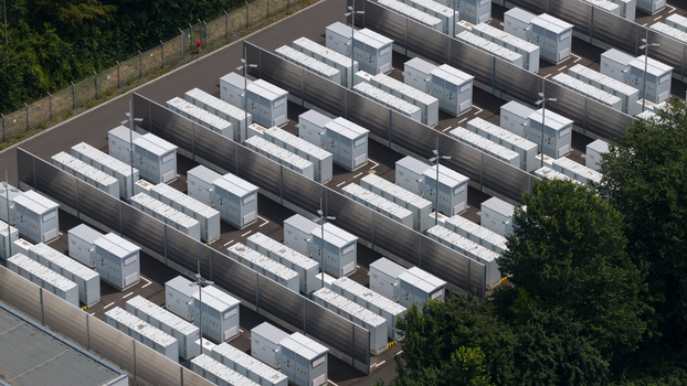 Aerial view of Battery Energy Storage Park Beside Traditional Power Plant Aerial view of Battery Energy Storage Park Beside Traditional Power Plant